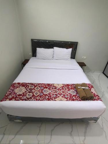 Cama o camas de una habitación en Joy Hotel