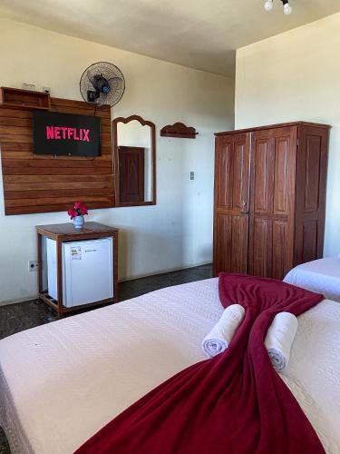 Katil atau katil-katil dalam bilik di Hotel Montanhas de Minas