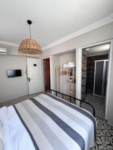 Postel nebo postele na pokoji v ubytování Nills butik otel