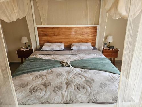 Postel nebo postele na pokoji v ubytování Ferienhaus in Hohenau, Paraguay - Casa Esperanza