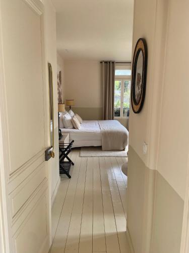 Letto o letti in una camera di VILLA DU CEDRE Honfleur