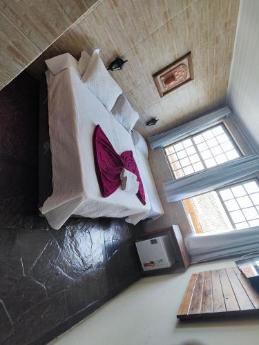 Katil atau katil-katil dalam bilik di Hotel Montanhas de Minas