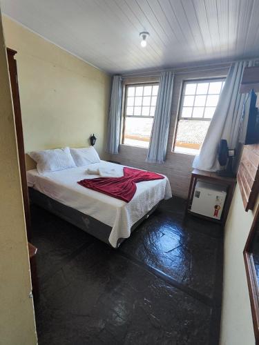 Katil atau katil-katil dalam bilik di Hotel Montanhas de Minas