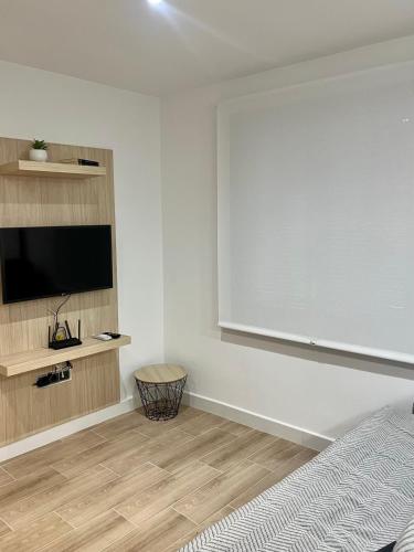 TV/trung tâm giải trí tại Apartamentos Rurales Miguela
