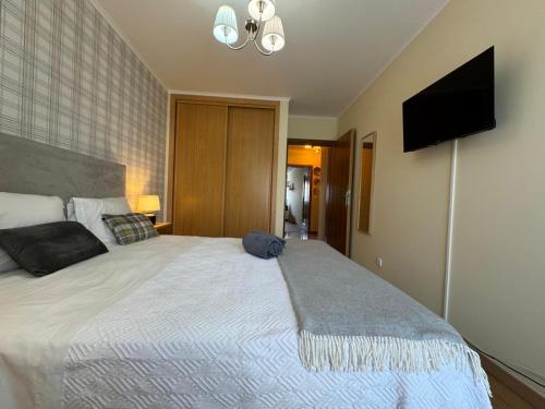 En eller flere senge i et værelse på comfortapartment