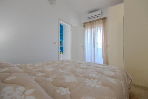 Ένα ή περισσότερα κρεβάτια σε δωμάτιο στο Villa Magnolia