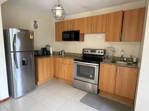 Kuchyň nebo kuchyňský kout v ubytování JV Condos Jaco
