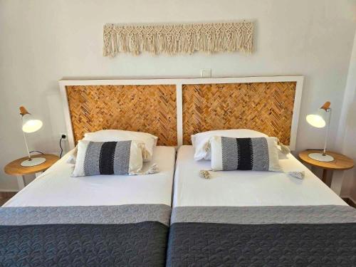 Ein Bett oder Betten in einem Zimmer der Unterkunft Papafotis Apartments & Suites