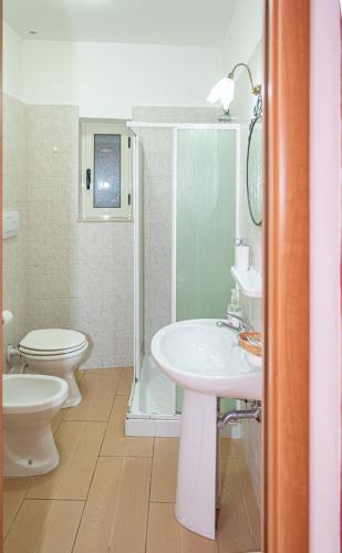 a bathroom with a sink and a toilet at L'Antica Caiatia in Caiazzo