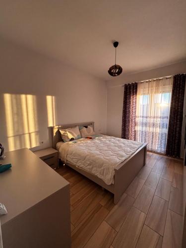 Ένα ή περισσότερα κρεβάτια σε δωμάτιο στο Jon's Apartment