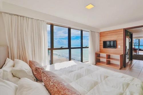 Giường trong phòng chung tại HY Hotels