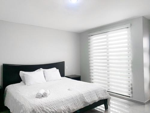 Ένα ή περισσότερα κρεβάτια σε δωμάτιο στο Luxurious house, bedrooms, private pool, parking