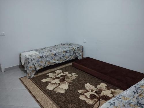 Postel nebo postele na pokoji v ubytování Maison Essid kelibia
