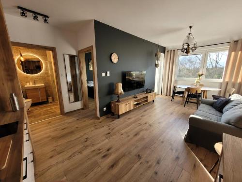 Ein Sitzbereich in der Unterkunft Apartament 39 City Park Szczecinek