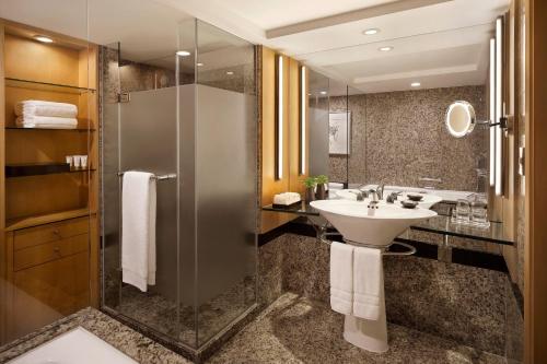a bathroom with a sink and a shower at Westin Josun Seoul Hotel in Seoul