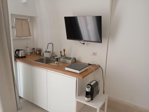 Kuchyň nebo kuchyňský kout v ubytování B&b La Fontana