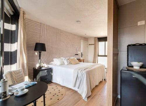 Ένα ή περισσότερα κρεβάτια σε δωμάτιο στο Monoambiente chic en Cordón Sur