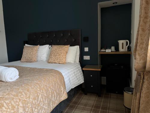 Postel nebo postele na pokoji v ubytování Sandvilla Guesthouse