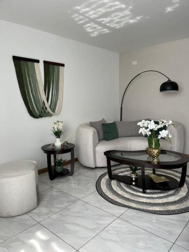 Posezení v ubytování Bello Penthouse con Alberca
