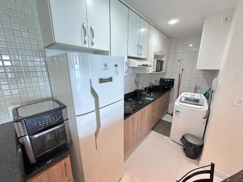 Kuchyň nebo kuchyňský kout v ubytování Frente Mar Itaparica