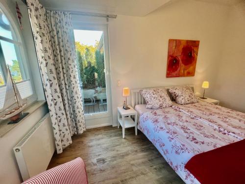 Ένα ή περισσότερα κρεβάτια σε δωμάτιο στο Appartement Meeresrauschen