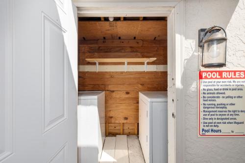 a laundry room with a washer and dryer at LIV Resort, Private Jacuzzi and Pet Friendly in Port Isabel