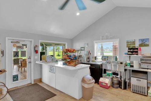 a kitchen with a counter and a counter top at LIV Resort, Private Jacuzzi and Pet Friendly in Port Isabel