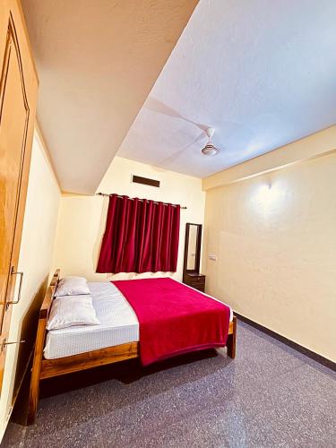 Postel nebo postele na pokoji v ubytování Mungaru Homestay, Talaguppa