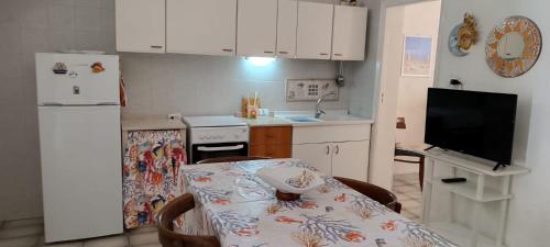 Kuchyň nebo kuchyňský kout v ubytování Vita sul Mare