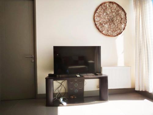 Μια τηλεόραση ή/και κέντρο ψυχαγωγίας στο Smart Host Rentals - ¡Tus sueños con vista al mar!