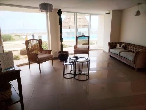 Χώρος καθιστικού στο Smart Host Rentals - ¡Tus sueños con vista al mar!