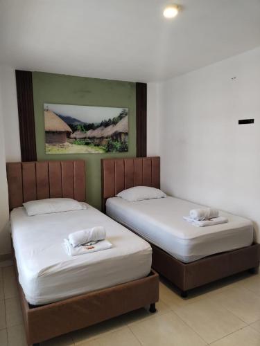 Кровать или кровати в номере Villalba Boutique Hotel