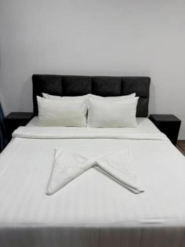 Postel nebo postele na pokoji v ubytování Agile Bukit Bintang TRX KL City Center Suite
