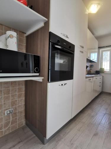 Kuchyň nebo kuchyňský kout v ubytování Villa Denise