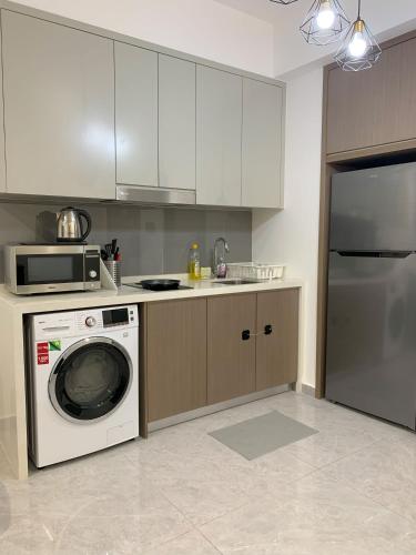 Kuchyň nebo kuchyňský kout v ubytování Agile Bukit Bintang TRX KL City Center Suite