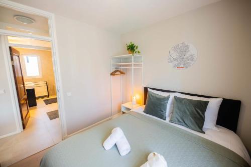 a bedroom with a bed and a large mirror at Supreme 75m2 Two-Bedroom Apartment - VW142 in Eindhoven