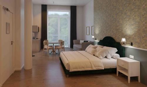 Postel nebo postele na pokoji v ubytování Whitlock16 - Luxe Aparthotel Montgomery Square Brussels