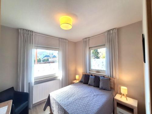 Katil atau katil-katil dalam bilik di Ferienwohnung in Bissendorf