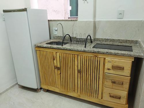 Dapur atau dapur kecil di EcoLoft, melhor localização do centro, espaçoso e com ar