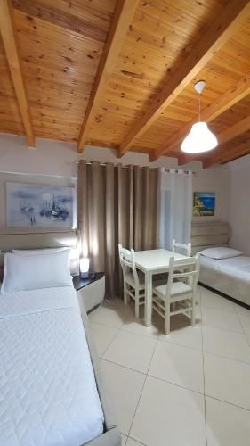 Krevet ili kreveti u jedinici u okviru objekta Hotel Vila Alvin & Apartments