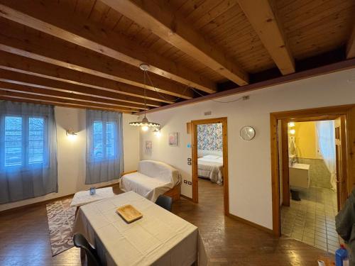 a large room with a bedroom and a living room at Residence Nonna Giuseppina in Casoni