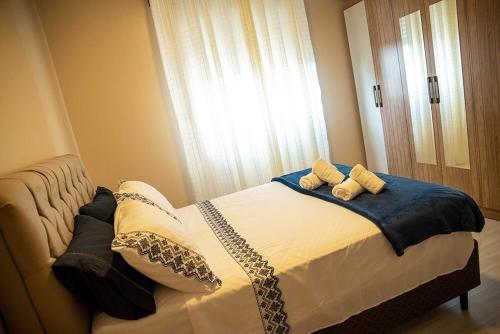 Кровать или кровати в номере Grande Apartamento Central