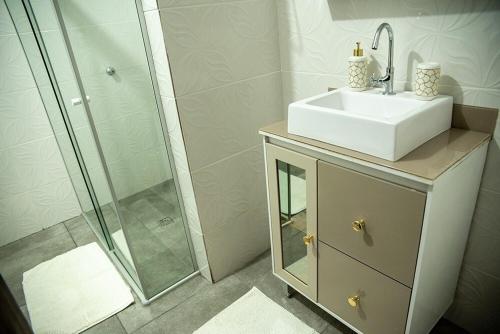Ванная комната в Grande Apartamento Central