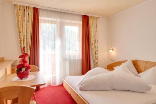 Postel nebo postele na pokoji v ubytování Hotel Theiner