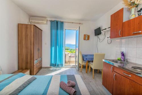 Kuchyň nebo kuchyňský kout v ubytování Apartment Goran