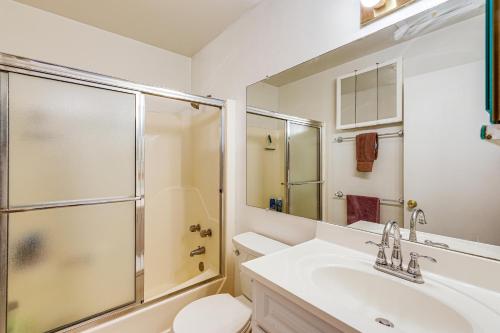 a bathroom with a shower and a sink and a toilet at 200 Feet to Beach Inviting Condo in Ocean City! in Ocean City