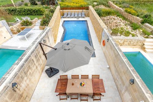 Piscina en o cerca de Solaris Gozitan Villa With Pool Gozo - Happy Rentals