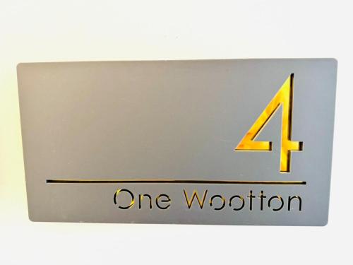 a one button sign with the number four on it at Central Bournemouth - 2-Bedroom - 4 Guests - Prime Spot in Bournemouth