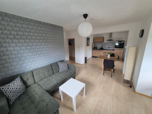 Kuchyň nebo kuchyňský kout v ubytování Apartment West