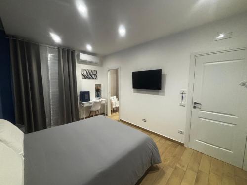 TV a/nebo společenská místnost v ubytování Engi Rooms - Marino